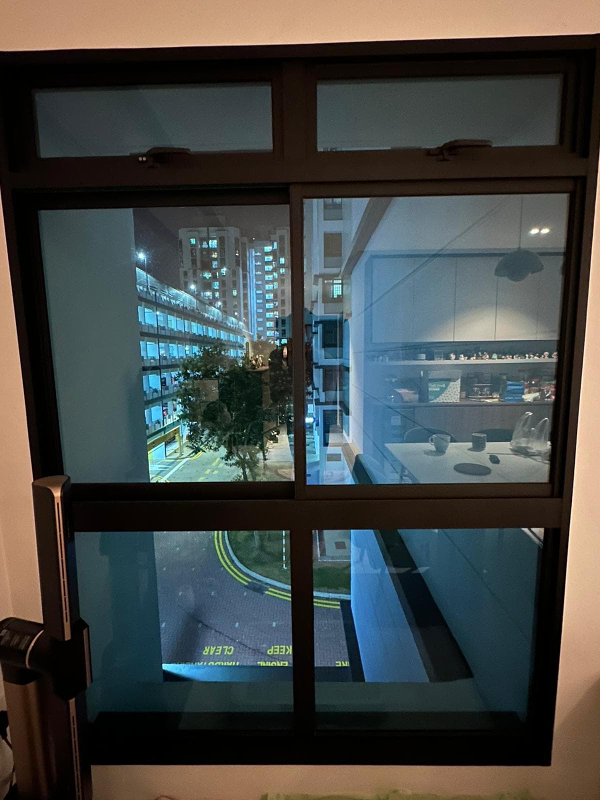 Retractable mesh installation in a Sembawang HDB flat